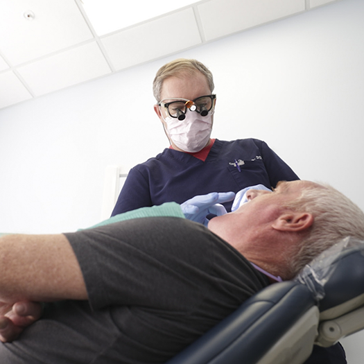 Senior man receiving a dental exam